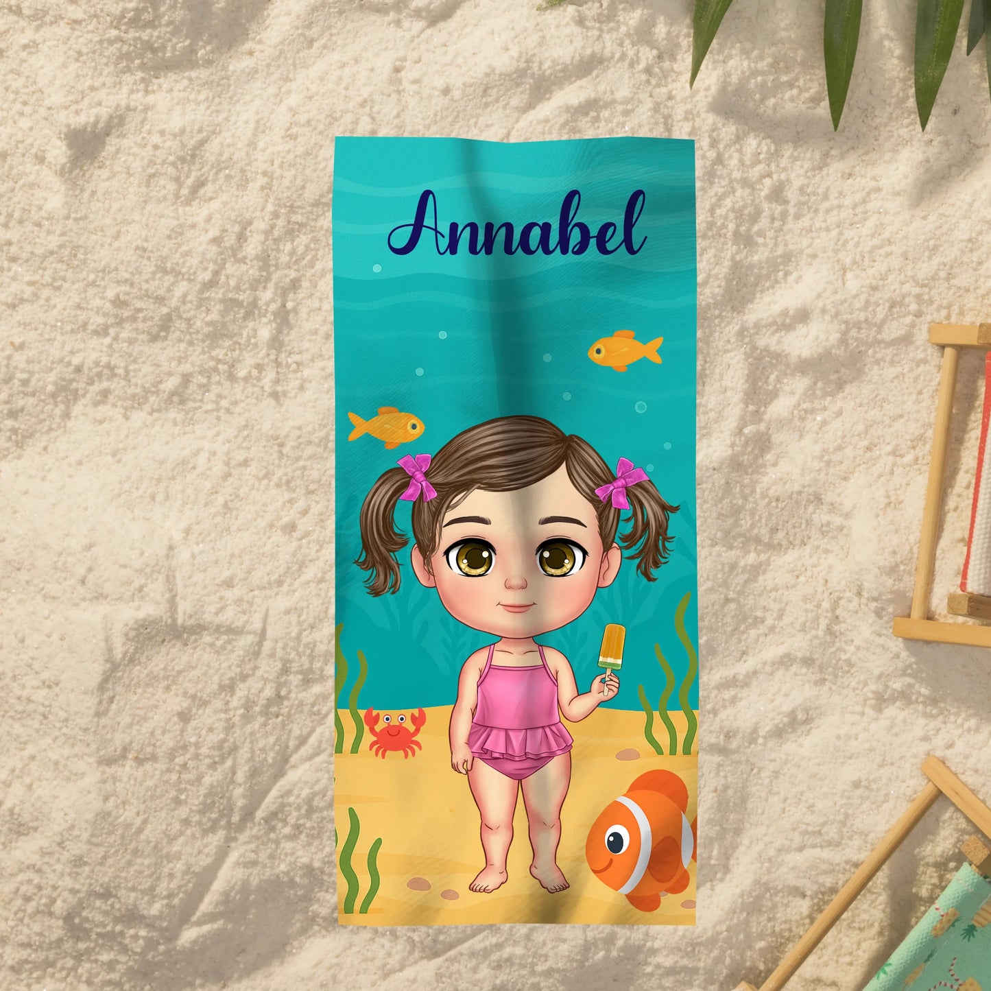 Persoonlijk strandlaken met gepersonaliseerd poppetje en naam